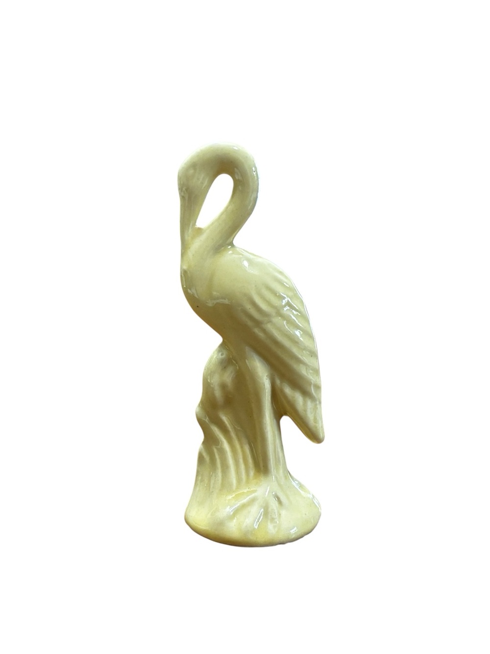 Shawnee Pottery miniature crane/stork figurine, in a soft yellow. Vintage